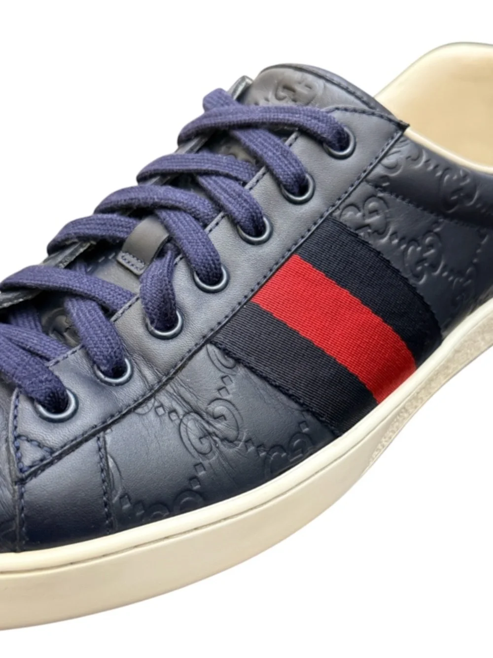 GUCCI - NAVY BLUE ALL LEATHER EMBOSSED MONOGRAM “ACE GG SUPREME” SNEAKERS